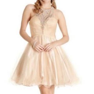 Cream colored knee length dress with stones